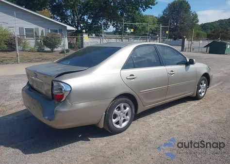 2002 Toyota Camry Le from USA, damaged, VIN 4T1BE32K22U545537